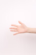 © Jun - hand showing number five In front of the white background