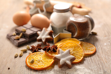 Wall Mural - gingerbread cookies with dried oranges and spices