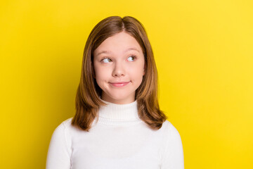 Sticker - Photo of young attractive little girl happy positive smile dream think look empty space isolated over yellow color background