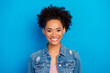 © deagreez - Photo of young happy cheerful woman wear casual denim jacket isolated on blue color background