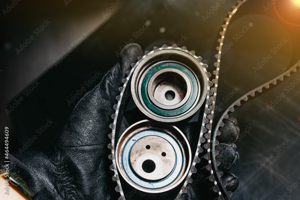 timing belt and tension rollers of the gas distribution system of the car engine, the concept of car maintenance