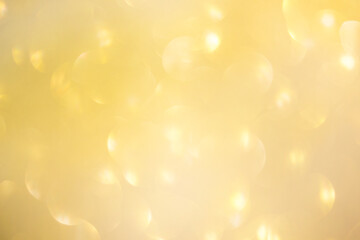 glitter gold bokeh background for graphic design or wallpaper