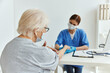 © SHOTPRIME STUDIO - nurse and patient professional examination medical office