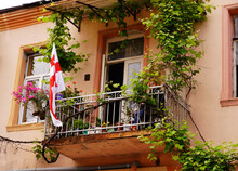 Flag Of Georgia On The Balcony