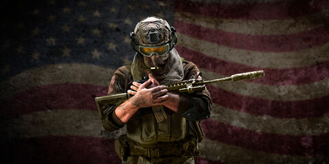 Soldier grieving for the fallen friends against the background of the American flag. Veterans Memorial Day concept.