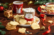 Christmas shortbread cookies with cocoa mug with marshmallows on a wooden table. Festive cookies with the words 