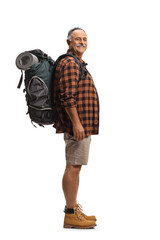 Poster - Cheerful mature hiker with a backpack standing and smiling