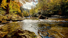 A Beautiful Mountain River In Western North Carolina, USA, In The Fall With The Fall Colors.