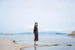 © peach100 - ビーチにいる女性