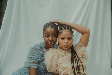 Wall Mural - sisters together in cornrows