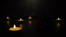 Halloween Ceramic Pumpkin With Flashing Lights And A Light Effect From The Background To Mean A Deity From Beyond The Grave