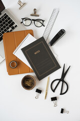 Wall Mural - Laptop computer, tablet pad, notes sheet on white table background. Flat lay, top view aesthetic minimal freelancer, blogger home office workspace
