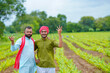 © Niks Ads - Young indian farmers at green turmeric agriculture field.