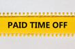 PTO, Paid time off symbol. White and yellowpaper with concept words 'PTO, Paid time off'. Beautiful yellow background, copy space. Business and PTO, paid time off concept.