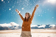 © cppzone - Happy girl toss the snow in mountains