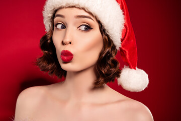  Photo of dreamy funky brunette lady look empty space send air kiss xmas eve isolated on dark gradient background