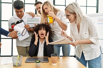 Sticker - Group of business workers screaming to stressed partner at the office.