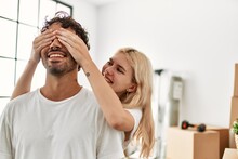 Woman Surprising Hes Boyfriend Covering Eyes At New Home.
