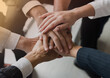 © kaweewat - Power of the new generation, Team work, Join forces to achieve the goal. Business people, employees shaking hands, energizing in a circle. The organization will grow with the power of the team.