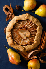Wall Mural - Pie or tart pear with spice on white background