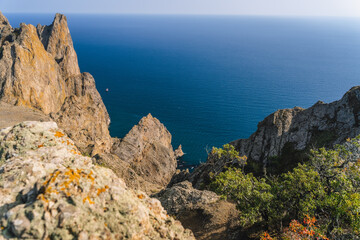 Wall Mural - Sheer cliffs near the sea of the volcanic formation Karadag in Koktebel Crimea