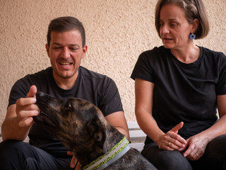 Hispanic couple with their dog