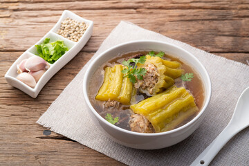 Wall Mural - Stuffed bitter gourd with seasoned minced pork soup and Glass Noodles (Gang Jeud Mara Sai Moo)