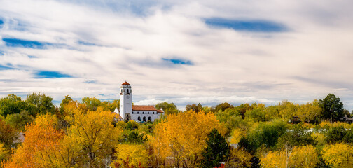 Wall Mural - Autumn tree view of the train depot in Boise Idaho with cloudy sky