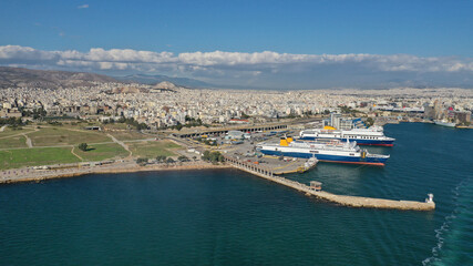 Wall Mural - Aerial drone photo of famous and busy port of Piraeus where passenger ferries travel to Aegean destination islands as seen from high altitude, Attica, Greece