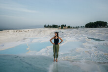 Tourist Girl On Travertine Pools And Terraces In Pamukkale In Southwestern Turkey