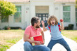 © Volodymyr - Teachers day. Father and son walking trough school park. Parent taking child to school.