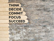 Inspirational and Motivational Concept - THINK DECIDE COMMIT FOCUS SUCCEED text background. Stock photo.