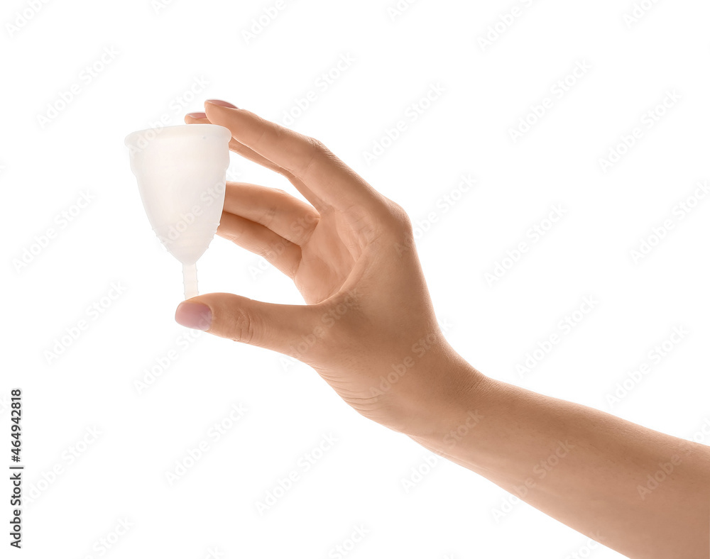 Female hand with menstrual cup on white background