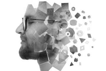 A profile portrait of a man combined with 3D shapes. Double exposure technique.