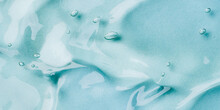 Transparent Hyaluronic Acid Gel On A Blue Background.