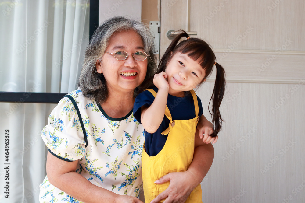 Elderly Grandmother With Cute Little Granddaughter Live At Home Elderly Grandmother With Cute Little Granddaughter Live At Home