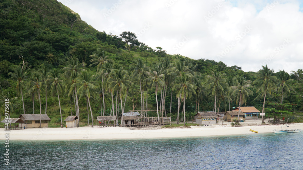 Ocean and jagged rock landscapes with turquoise water at Coron Island in Palawan, Philippines.