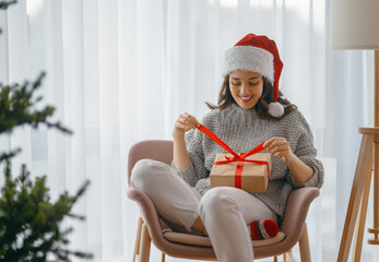 Canvas Print - woman with Christmas present