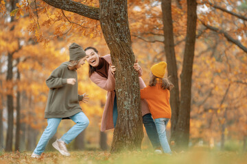 Wall Mural - Happy family on autumn walk