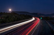 Dramatic motorway car light trails at night