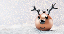 Reindeer Christmas Ball Ornament On Snow