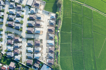 Land or landscape of green field in aerial view. Include agriculture farm, house building, village. That real estate or property. Plot of land to housing construction in Chiang Mai of Thailand.