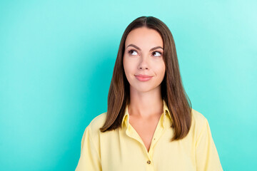 Poster - Photo of cool young brunette lady look empty space wear yellow blouse isolated on teal color background