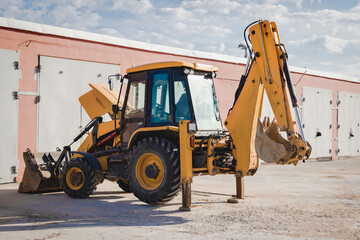 repair of a broken excavator. excavator without a wheel. breakdown of a construction loader during o