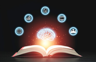 Wall Mural - Glowing virtual brain floats above an open book with leaning icons on dark background which is a symbol of study a knowledge will help solve problem and solution concept.
