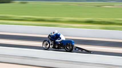 Canvas Print - Side view of a motorcycle during a drag racing in Kearney, NE