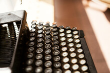 Aged Retro Typewriter In Sunlight