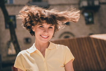 Wall Mural - Photo of happy nice pretty cheerful woman good mood fly hair blow wind weekend outside outdoors city town