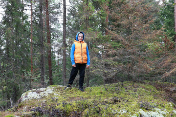 Child at foot of Mount Hiidenvuori