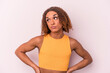 © Asier - Young latin transsexual woman isolated on pink background confused, feels doubtful and unsure.